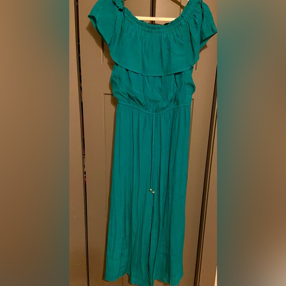 Green jumpsuit off shoulder
